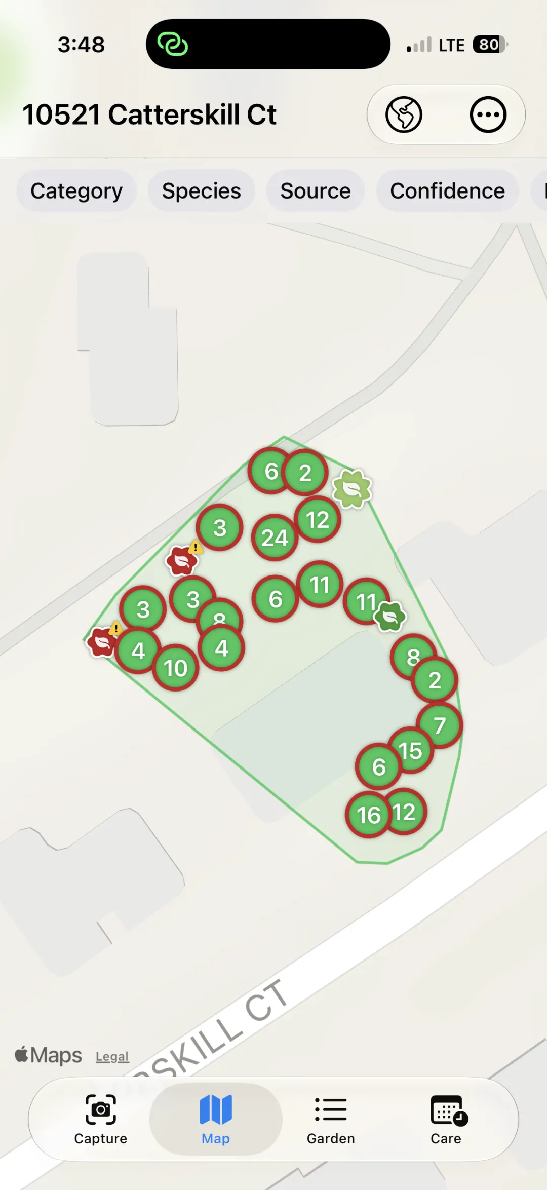 Map tab showing clustered plant pins over the garden